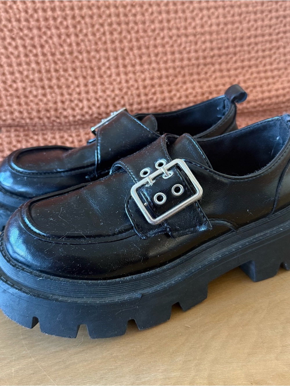 Chunky black platform Loafers with silver buckle detail
